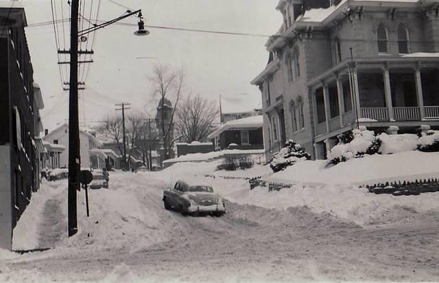 Church Street looking north from William Street. Reap Mansion on the right; St. Casmir's in the distance
